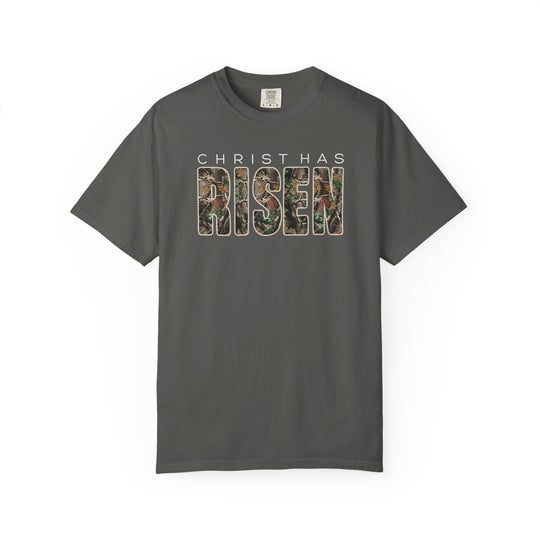Christ Has Risen Tee with woodland camouflage design, unisex Comfort Colors style, featuring relaxed fit and garment-dyed fabric for ultimate comfort.