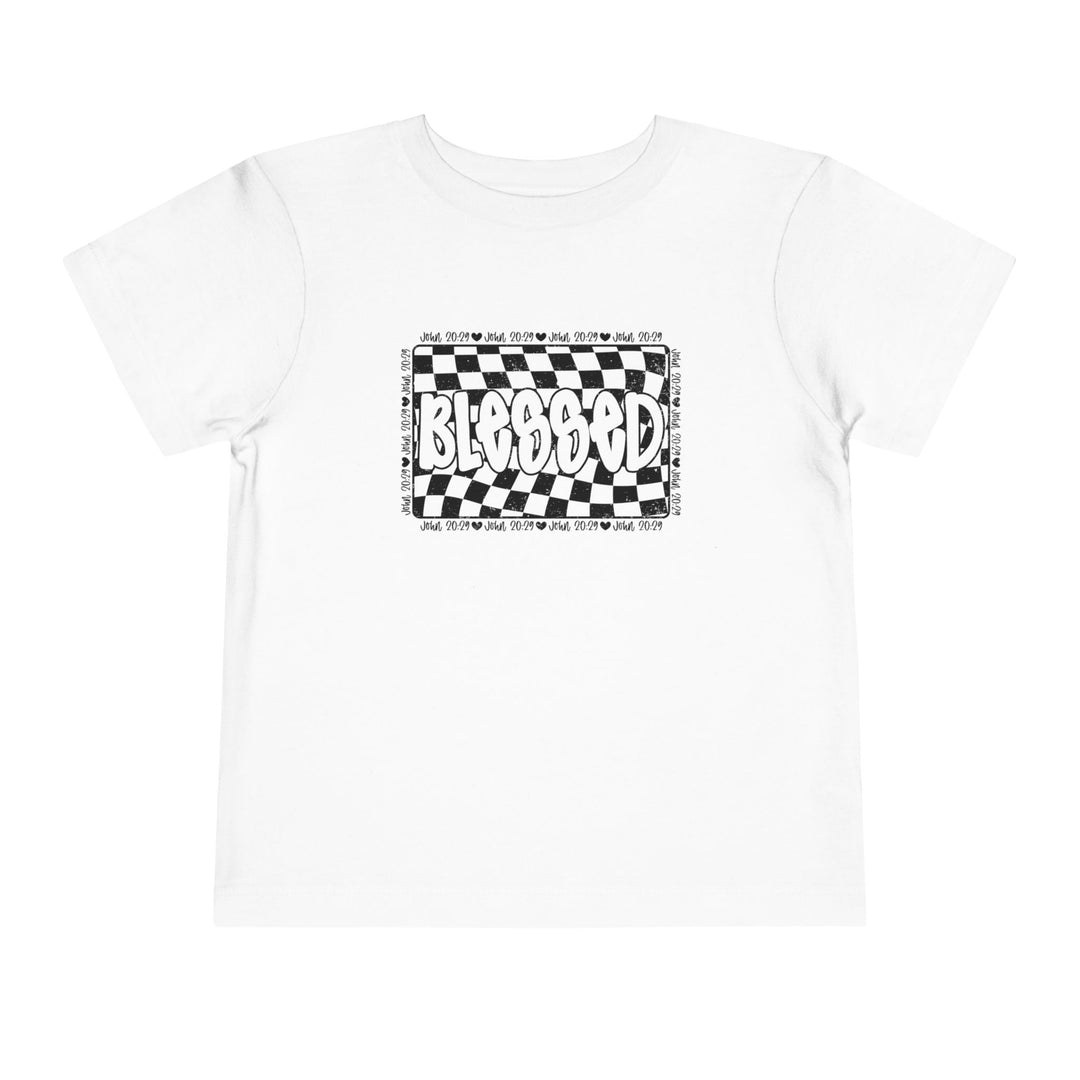 Blessed Toddler Tee: White t-shirt featuring a black and white checkered design, perfect for kids, made from 100% Airlume cotton with a tear-away label for comfort.