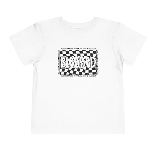 Blessed Toddler Tee: White t-shirt featuring a black and white checkered design, perfect for kids, made from 100% Airlume cotton with a tear-away label for comfort.