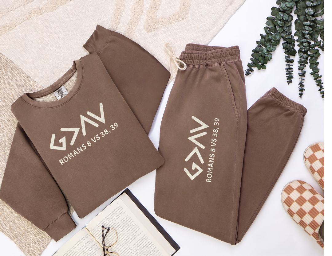 God is Greater Sweatpants: brown, relaxed-fit sweatpants with white text, crafted from 100% ringspun cotton for a vintage look and feel.