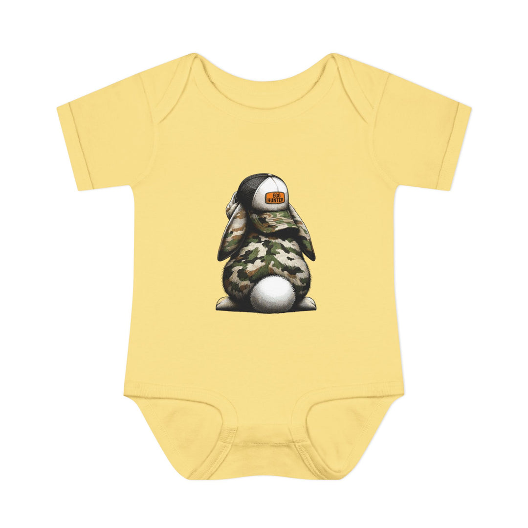 Egg Hunter Onesie featuring a cartoon bunny in a hat, crafted from soft, ring-spun cotton. Designed for comfort with lap shoulders for easy dressing.