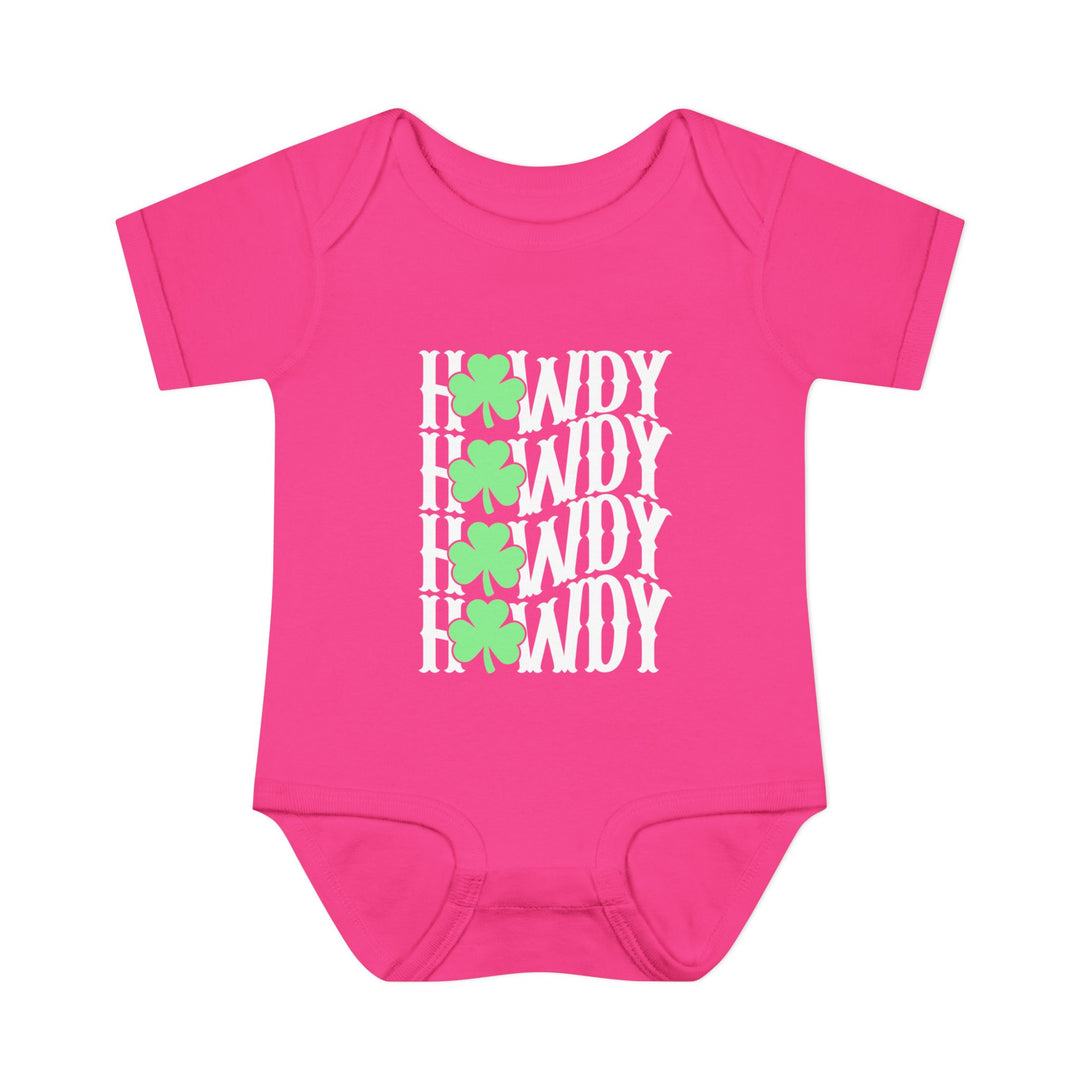 Howdy Lucky Onesie: A soft pink baby bodysuit featuring white text, designed for comfort with lap shoulders and made from 100% combed ring-spun cotton.