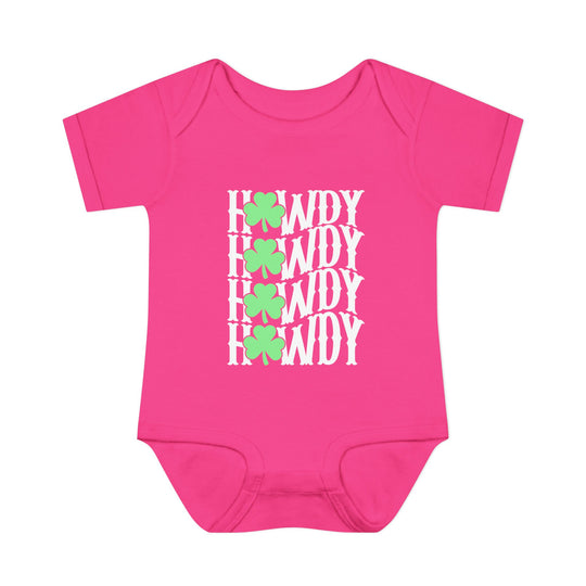 Howdy Lucky Onesie: A soft pink baby bodysuit featuring white text, designed for comfort with lap shoulders and made from 100% combed ring-spun cotton.