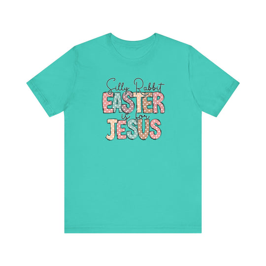 Silly Rabbit Easter is for Jesus Tee: A blue shirt with playful text, featuring short sleeves and a classic unisex fit, ideal for casual wear.