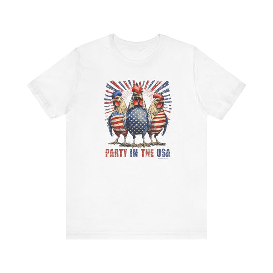 A white t-shirt featuring a red, white, and blue design with roosters, part of the Party In the USA Tee collection by Worlds Worst Tees. Unisex jersey tee made of 100% Airlume combed and ringspun cotton, with ribbed knit collars and taping on shoulders for durability.