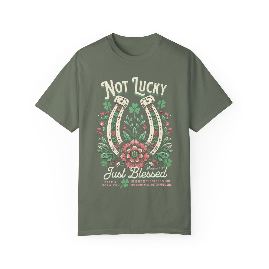 Blessed Tee: A green t-shirt featuring a detailed graphic of a horseshoe surrounded by flowers, crafted from soft, garment-dyed cotton for comfort and durability.