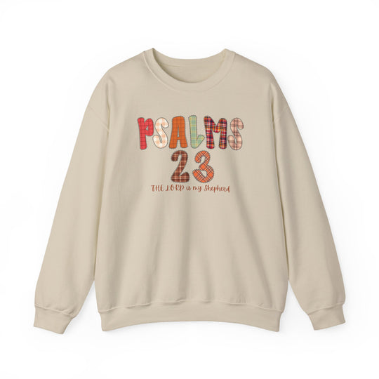 Light-beige crewneck sweatshirt with “PSALMS 23” in colorful lettering and cursive “The Lord is my shepherd” below, from Faith Family Designs.