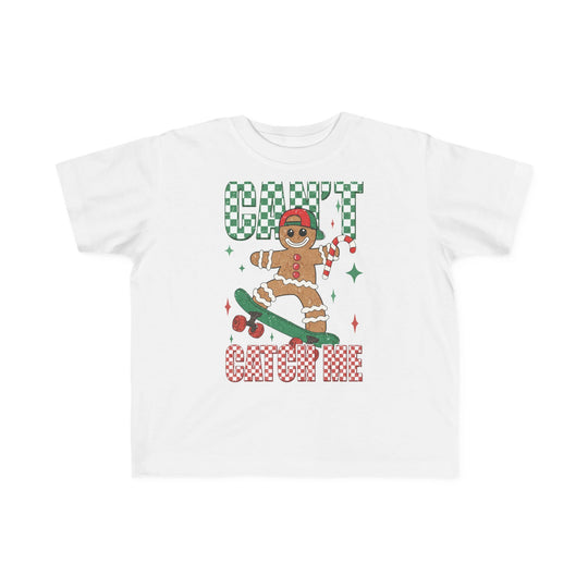 Can't Catch Me Toddler Tee featuring a gingerbread character on a skateboard, playful holiday theme, soft cotton perfect for sensitive skin, durable and high-quality print.