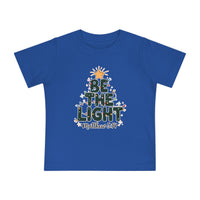 Be the Light Baby Tee featuring a Christmas-themed graphic with “BE THE LIGHT” tree design, perfect for toddlers. Made from soft, shrink-resistant cotton for comfort.