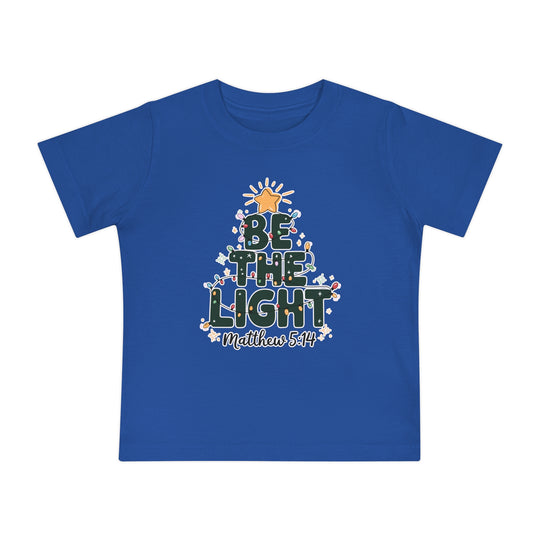 Be the Light Baby Tee featuring a Christmas-themed graphic with “BE THE LIGHT” tree design, perfect for toddlers. Made from soft, shrink-resistant cotton for comfort.