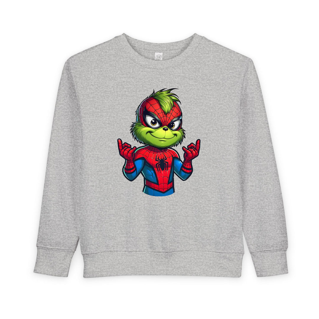 Christmas Spider Toddler Crew sweatshirt features the Grinch in Spider-Man suit on light-gray fabric, blending comfort with whimsical, fun design for toddlers.