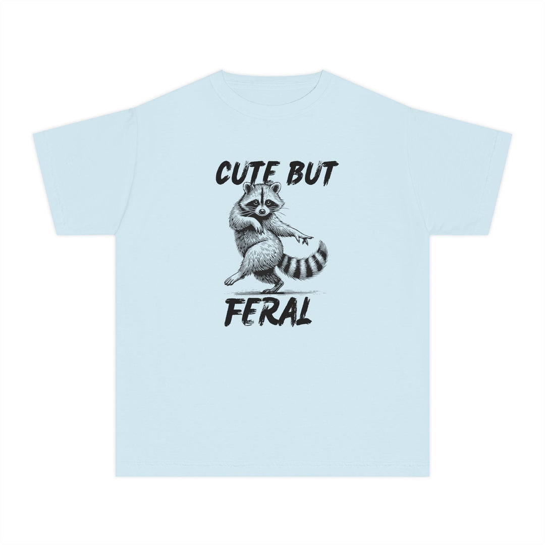 Cute but Feral Kids Tee featuring a stylized raccoon and slogan, designed for comfort and agility in 100% combed cotton, perfect for active kids.