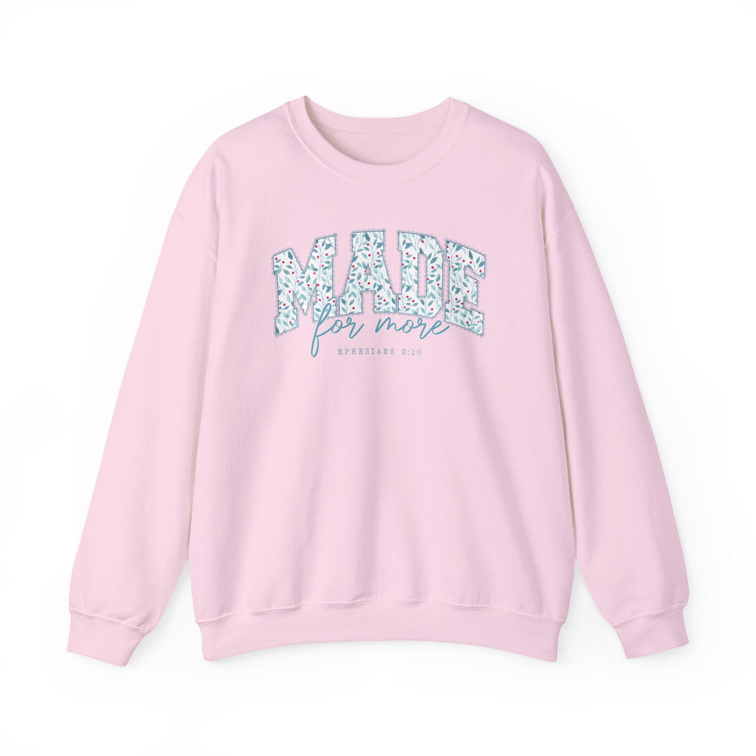 Light pink Made for More Crew sweatshirt with floral MADE design, for more cursive, and EPHESIANS 2:10 reference on front.