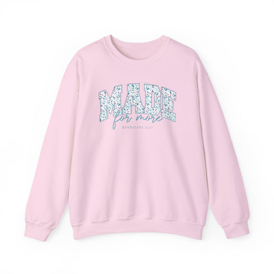 Light pink Made for More Crew sweatshirt with floral MADE design, for more cursive, and EPHESIANS 2:10 reference on front.