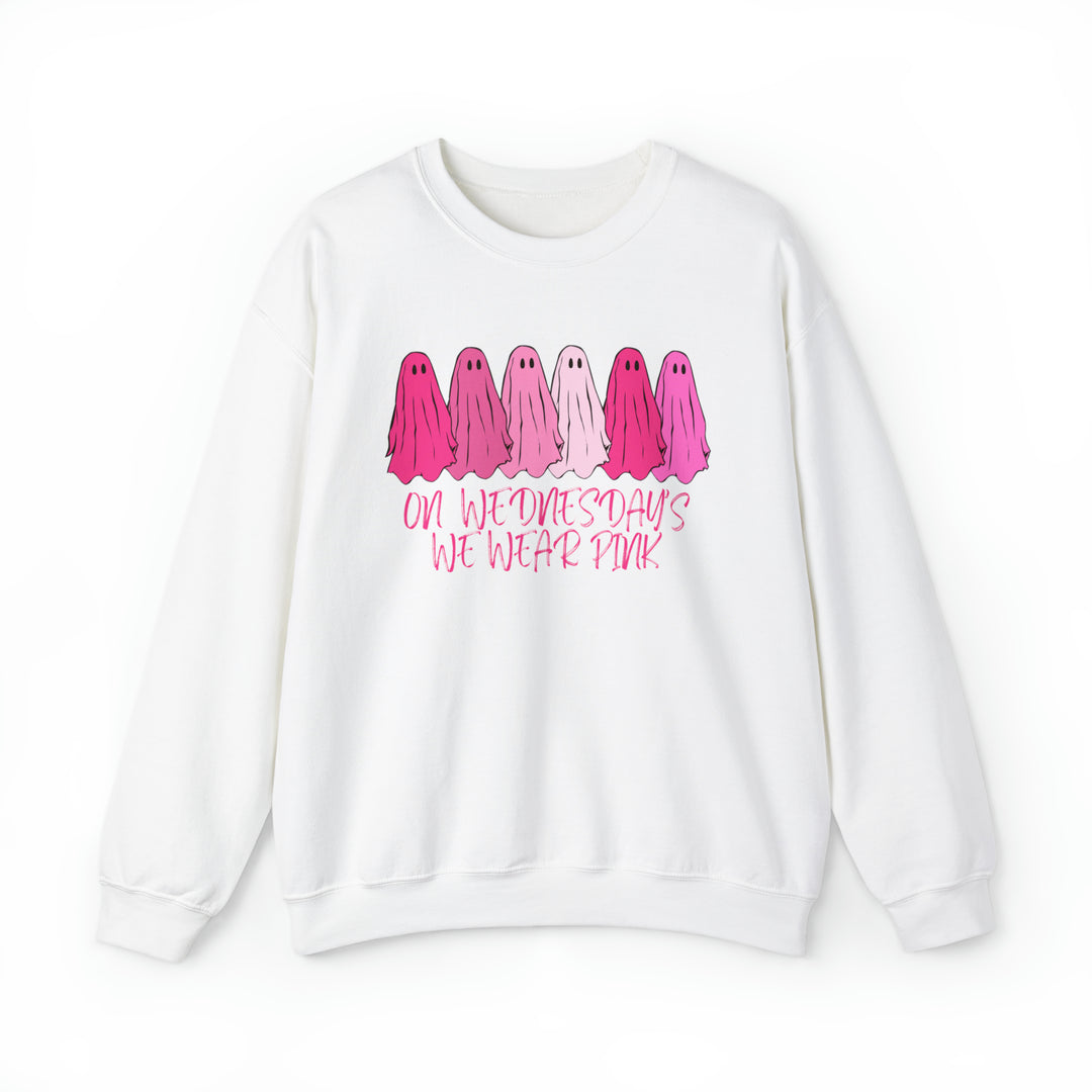 Unisex heavy blend crewneck sweatshirt featuring On Wednesday's We Wear Pink crew design. Ribbed knit collar, no itchy side seams, 50% cotton, 50% polyester, loose fit, medium-heavy fabric. Sewn-in label, true to size.