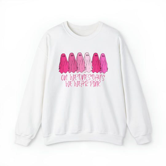 Unisex heavy blend crewneck sweatshirt featuring On Wednesday's We Wear Pink crew design. Ribbed knit collar, no itchy side seams, 50% cotton, 50% polyester, loose fit, medium-heavy fabric. Sewn-in label, true to size.
