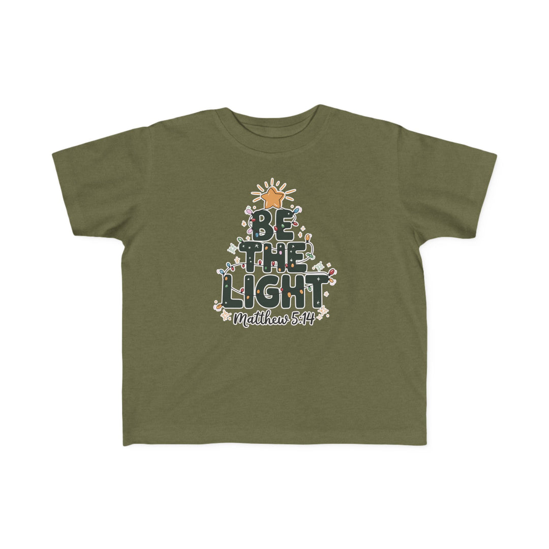 Be the Light Toddler Tee: Olive-green, short-sleeve with BE THE LIGHT Christmas tree design, Matthew 5:14 reference; soft, durable for toddlers' sensitive skin.