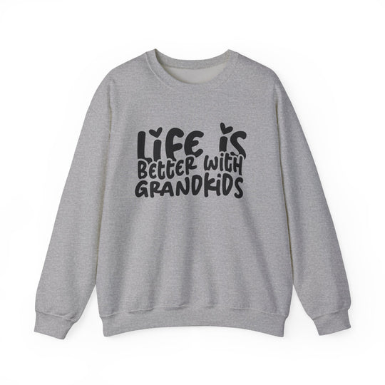 Light-gray crewneck sweatshirt with Life is better with grandkids in black hand-lettered text, featuring heart-dotted i’s. Comfortable, unisex design from Faith Family Designs.