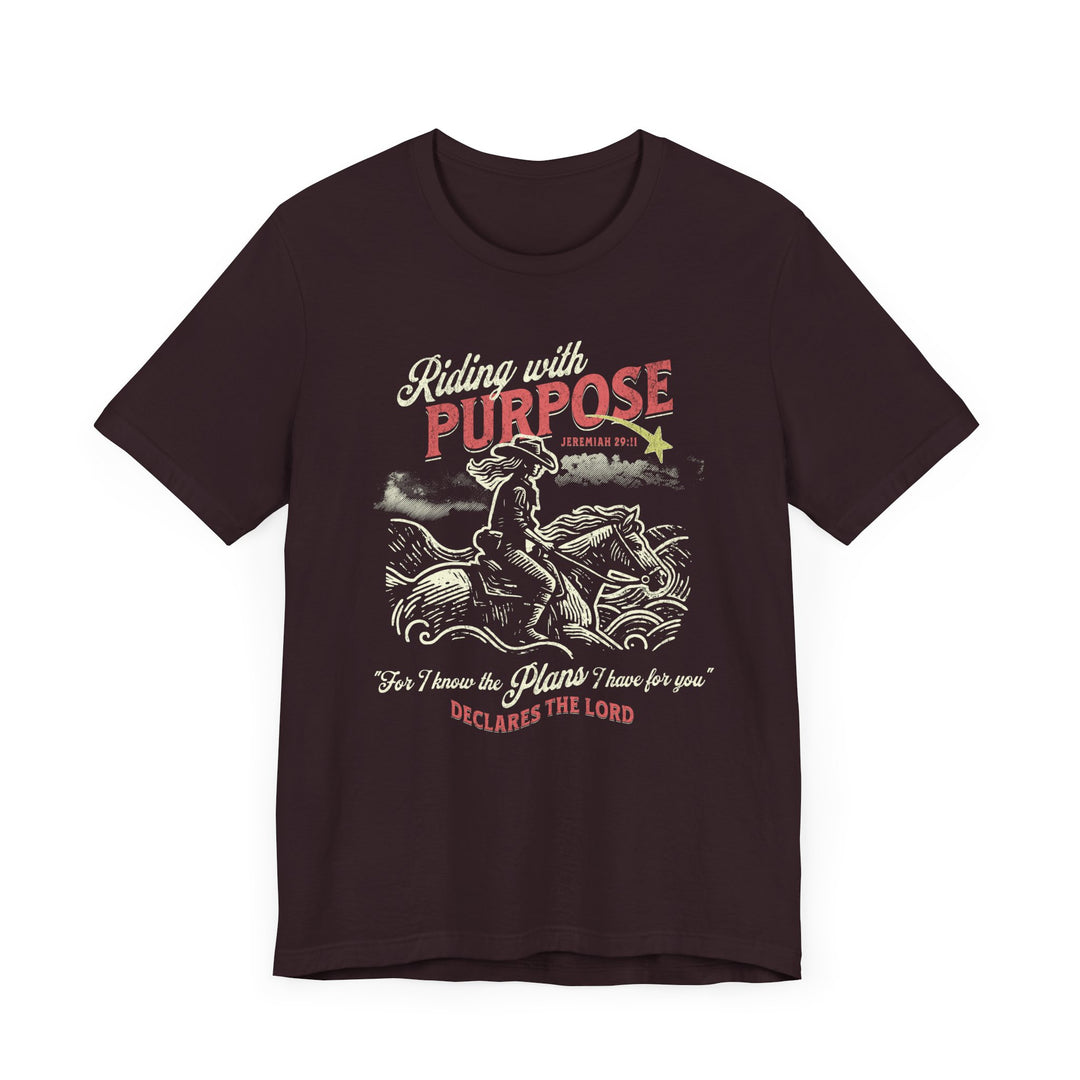 Riding for a Purpose Tee: Black t-shirt featuring a graphic of a cowboy riding a horse, crafted from soft cotton with a comfortable fit.