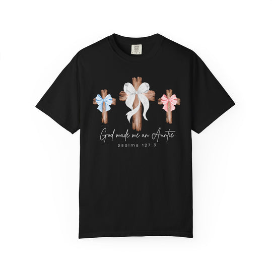 Black t-shirt with three wooden crosses and ribbons, script text God made me an Auntie and psalms 127:3 below, offering a relaxed fit.