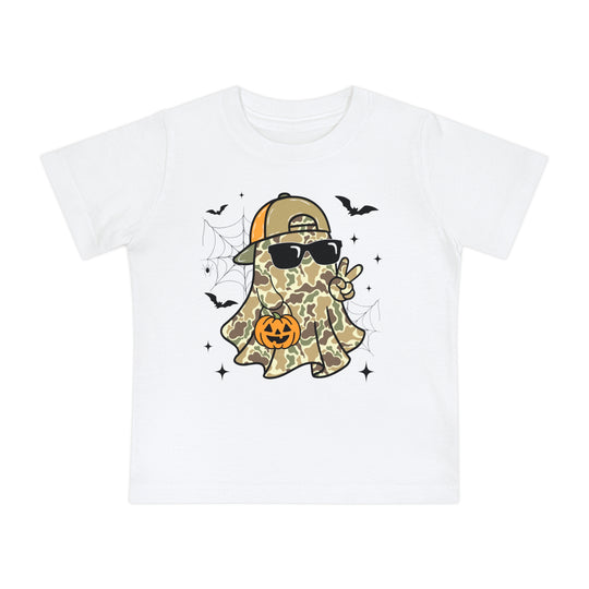 Candy Ghost Baby Tee featuring a cartoon ghost in camouflage with sunglasses, peace sign, and pumpkin bucket, surrounded by bats, spiderwebs, and sparkles.