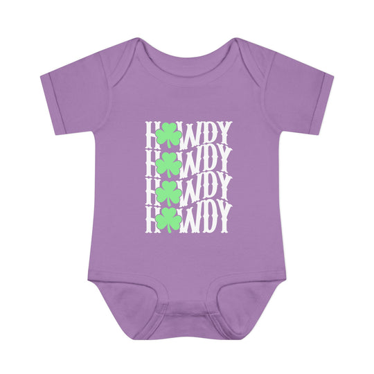 Howdy Lucky Onesie: A purple baby bodysuit featuring white text and green clovers, made from soft, 100% combed ringspun cotton, designed for infant comfort and ease.