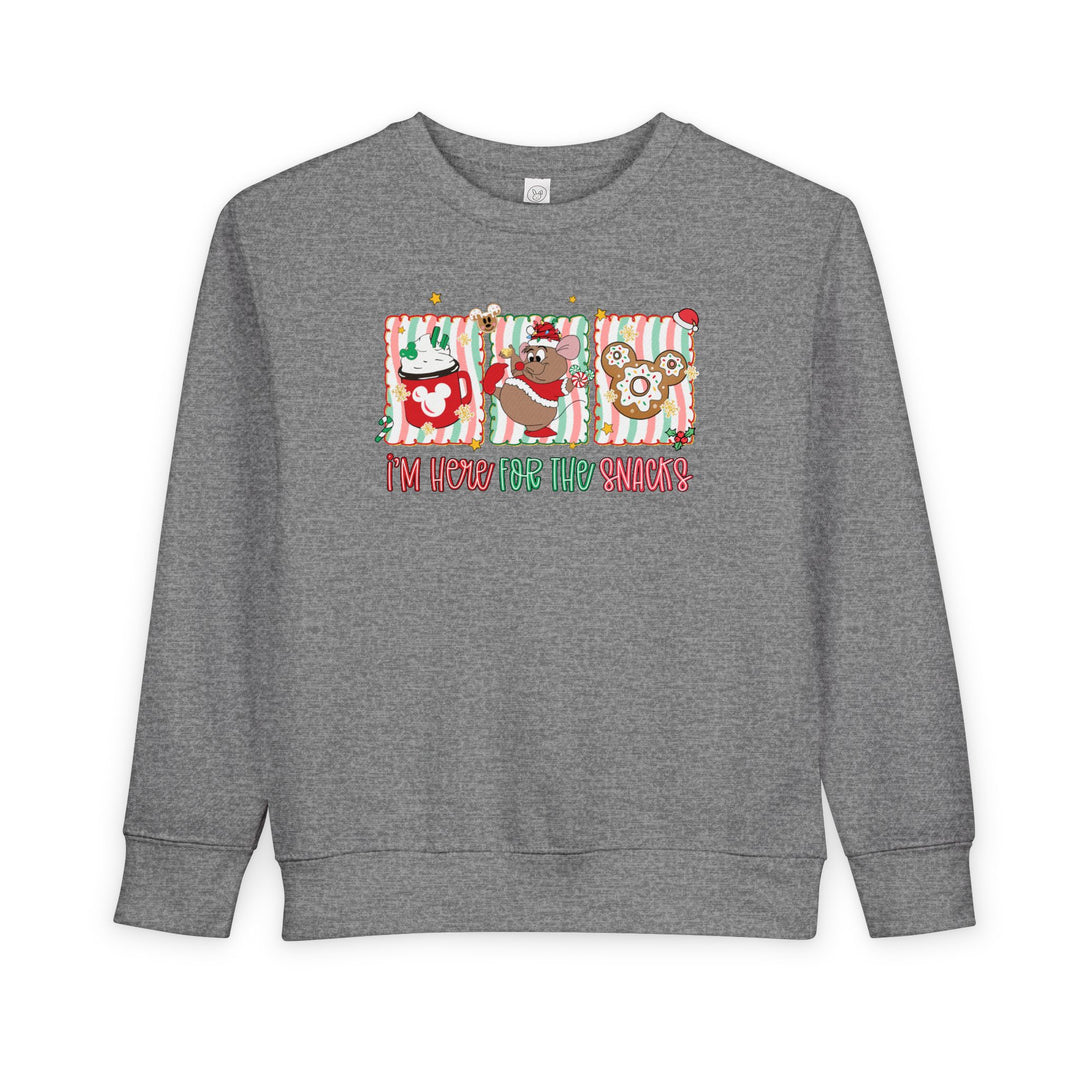 Here for the Snacks Toddler Crew: Light-grey sweatshirt with festive Mickey-ear style holiday snack graphics and I’m here for the snacks in red and green lettering.