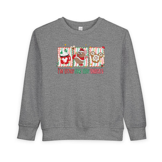 Here for the Snacks Toddler Crew: Light-grey sweatshirt with festive Mickey-ear style holiday snack graphics and I’m here for the snacks in red and green lettering.