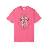 Proverbs 31:25 Tee featuring a wooden cross with a pink ribbon bow and inspirational scripture, designed for comfort in a ladies’ cut, size Large.