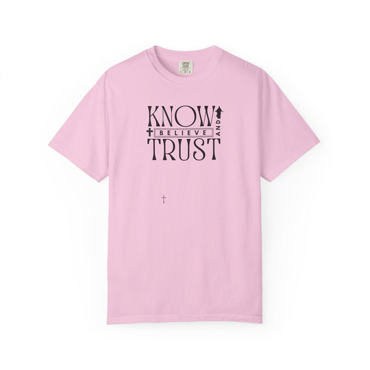 Know, Trust, Believe Tee: Pink t-shirt with bold black text, designed for comfort with garment-dyed, ring-spun cotton. Ideal for everyday wear, offering a relaxed, durable fit.