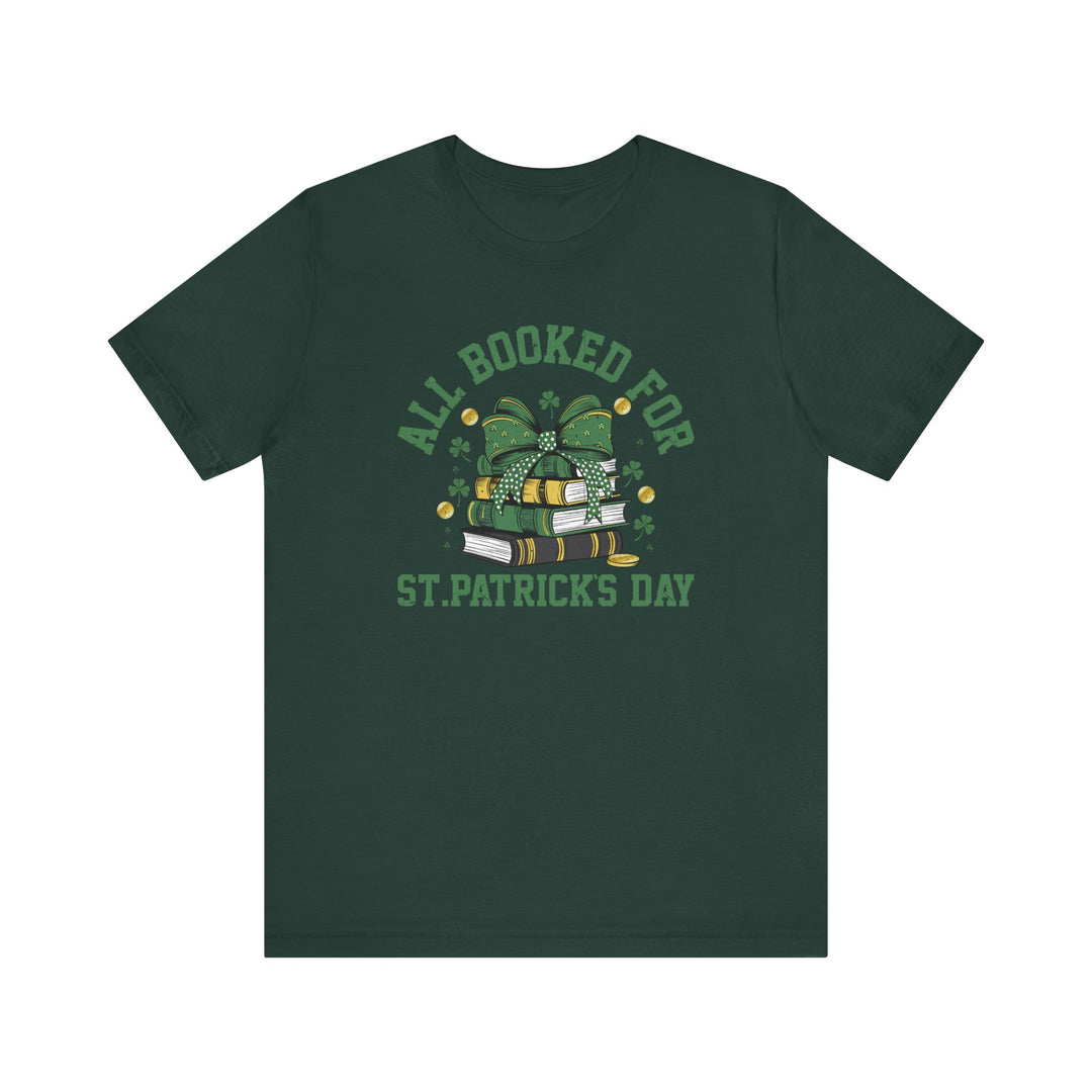Booked for St. Patrick's Day Tee featuring a stack of books with a bow design, short sleeves, and ribbed knit collar, offering a comfortable fit.