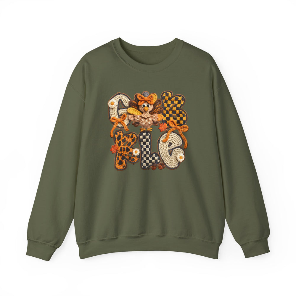 Olive-green Gobble Crew sweatshirt with autumn-themed graphic, featuring GOBBLE in vibrant letters and cartoon turkey, perfect for cozy fall gatherings.