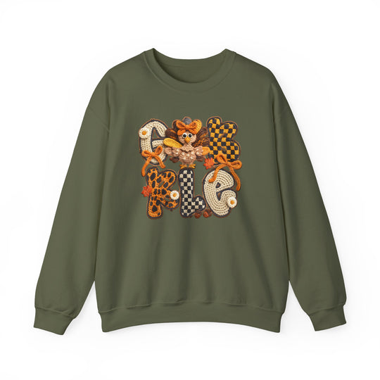 Olive-green Gobble Crew sweatshirt with autumn-themed graphic, featuring GOBBLE in vibrant letters and cartoon turkey, perfect for cozy fall gatherings.