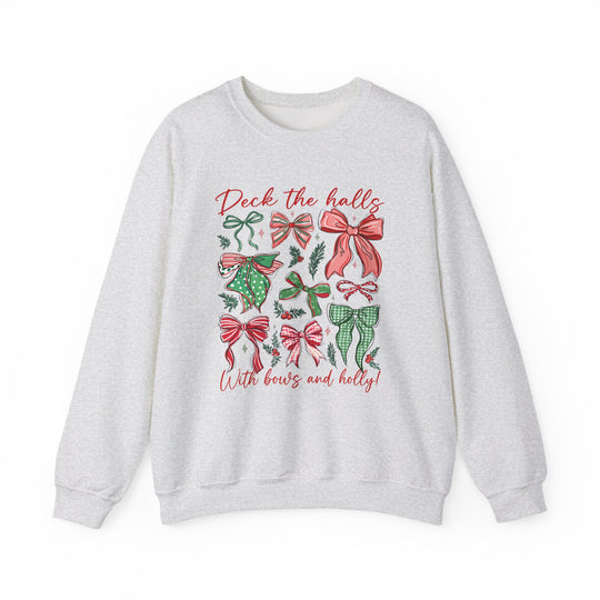 Light-gray Deck the Halls Crew sweatshirt with red and green bows, holly sprigs, and festive text. Cozy and durable with a classic fit.