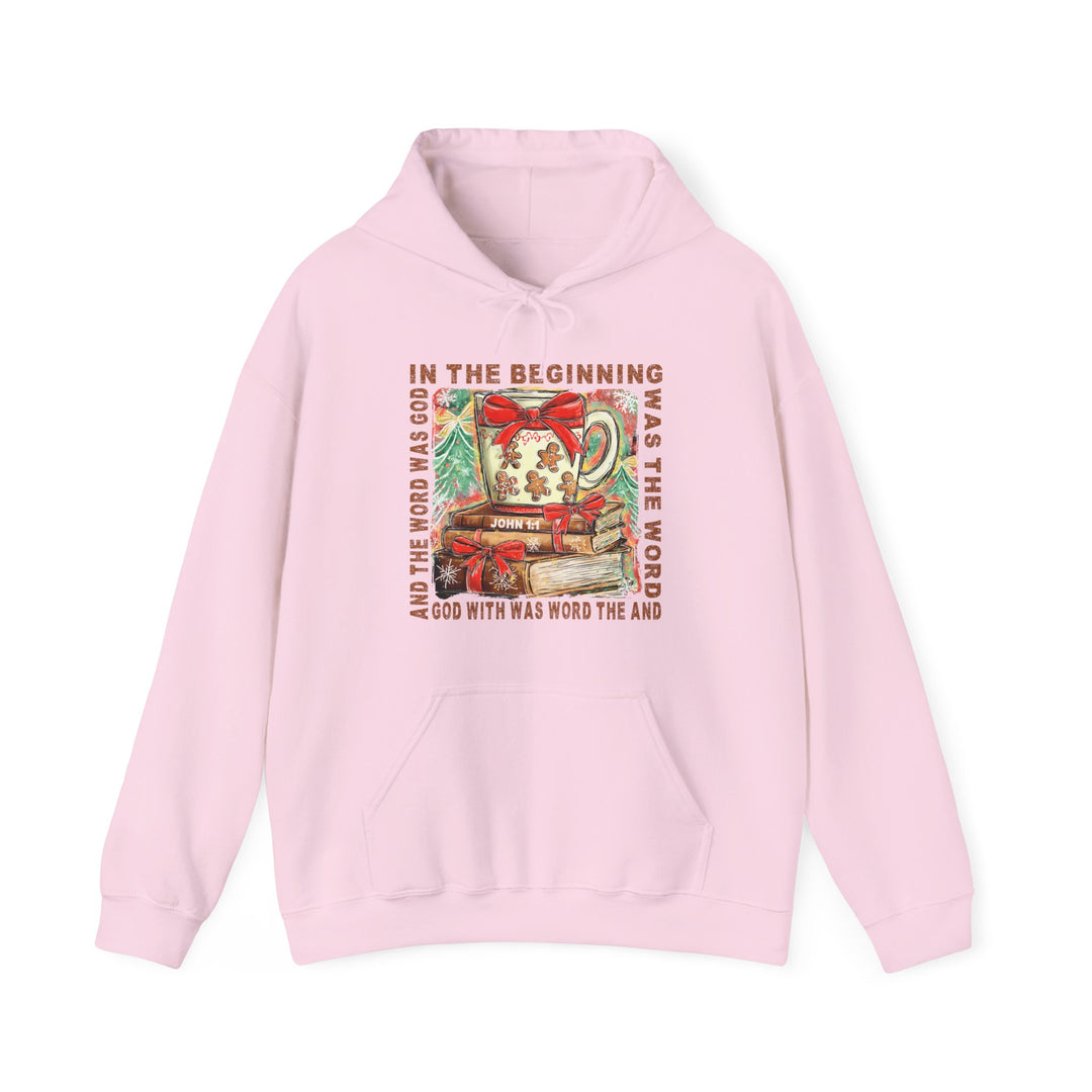 In the Beginning Hoodie with festive Bible-verse graphic, featuring gingerbread mug, books, and pine branches. Cozy, cotton-polyester blend with kangaroo pocket and matching drawstring.