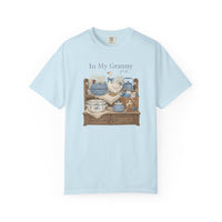 In My Granny Era Tee featuring a cozy vintage still life with ceramic goose, porcelain tureen, and yarn basket, evoking nostalgic charm.