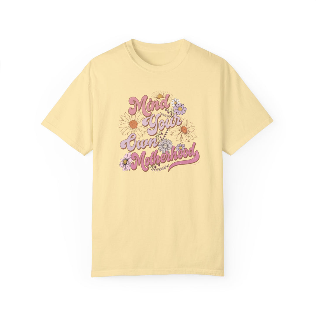A relaxed fit Mind Your Motherhood Tee, 100% ring-spun cotton, medium weight, garment-dyed for coziness. Double-needle stitching, no side-seams for durability and shape retention.