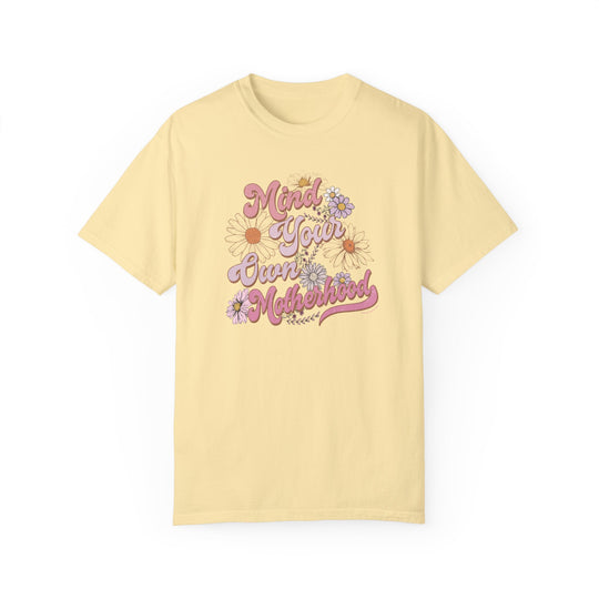 A relaxed fit Mind Your Motherhood Tee, 100% ring-spun cotton, medium weight, garment-dyed for coziness. Double-needle stitching, no side-seams for durability and shape retention.