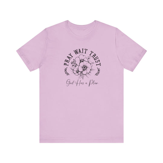Pray Wait Trust Tee featuring a delicate floral graphic on a pink background, crafted from soft cotton with a comfortable, classic fit.