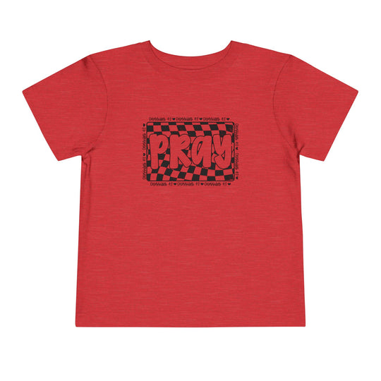 Pray Toddler Tee: A red toddler t-shirt featuring a bold black and red design, made from 100% Airlume cotton for comfort and durability.
