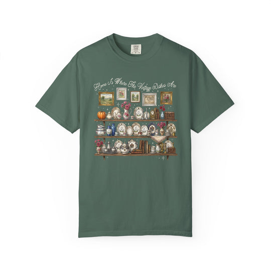 Forest-green Vintage Dishes Tee with intricate graphic of shelves displaying vintage china and decor, featuring “Home Is Where The Vintage Dishes Are” text.