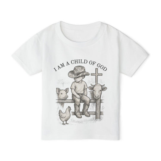 I am a Child of God Toddler Tee features a cowboy-hat boy on fence with animals, promoting comfort and eco-friendly style from Faith Family Designs.