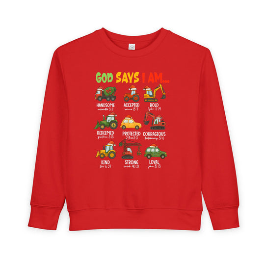 God Says Christmas Truck Toddler Crew sweatshirt features nine Santa-hat construction vehicles with affirmations, perfect for cozy, faith-inspired toddler wear.