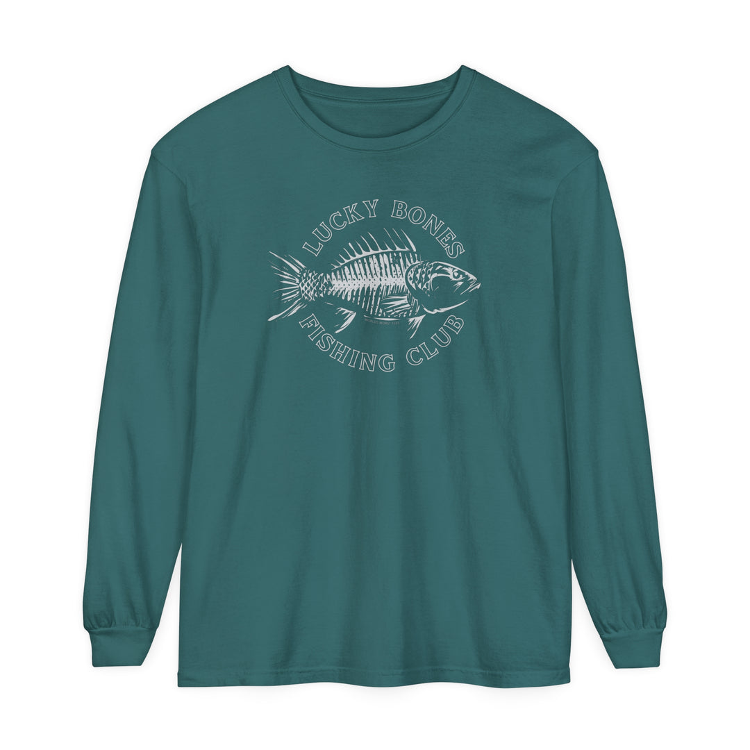 A Lucky Bones Fishing Club Long Sleeve Tee featuring a fish graphic on green fabric. Made of 100% ring-spun cotton, garment-dyed, with a relaxed fit for ultimate comfort. Ideal for casual settings.