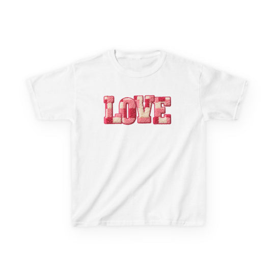 Kids' Love Tee: A white T-shirt featuring textured LOVE in pink and cream, designed for durability and comfort with 100% cotton fabric.