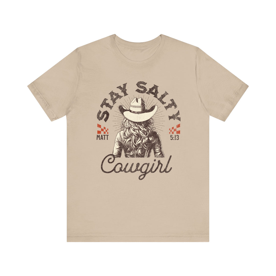 Stay Salty Tee features a tan t-shirt with a cowboy hat graphic, perfect for those seeking a unique and comfortable jersey short sleeve design.