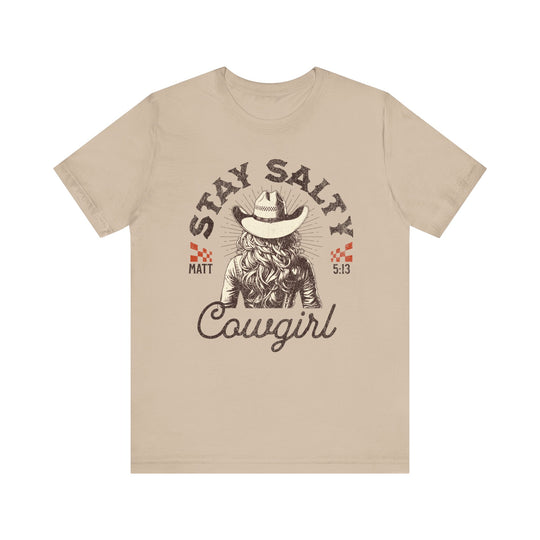 Stay Salty Tee features a tan t-shirt with a cowboy hat graphic, perfect for those seeking a unique and comfortable jersey short sleeve design.