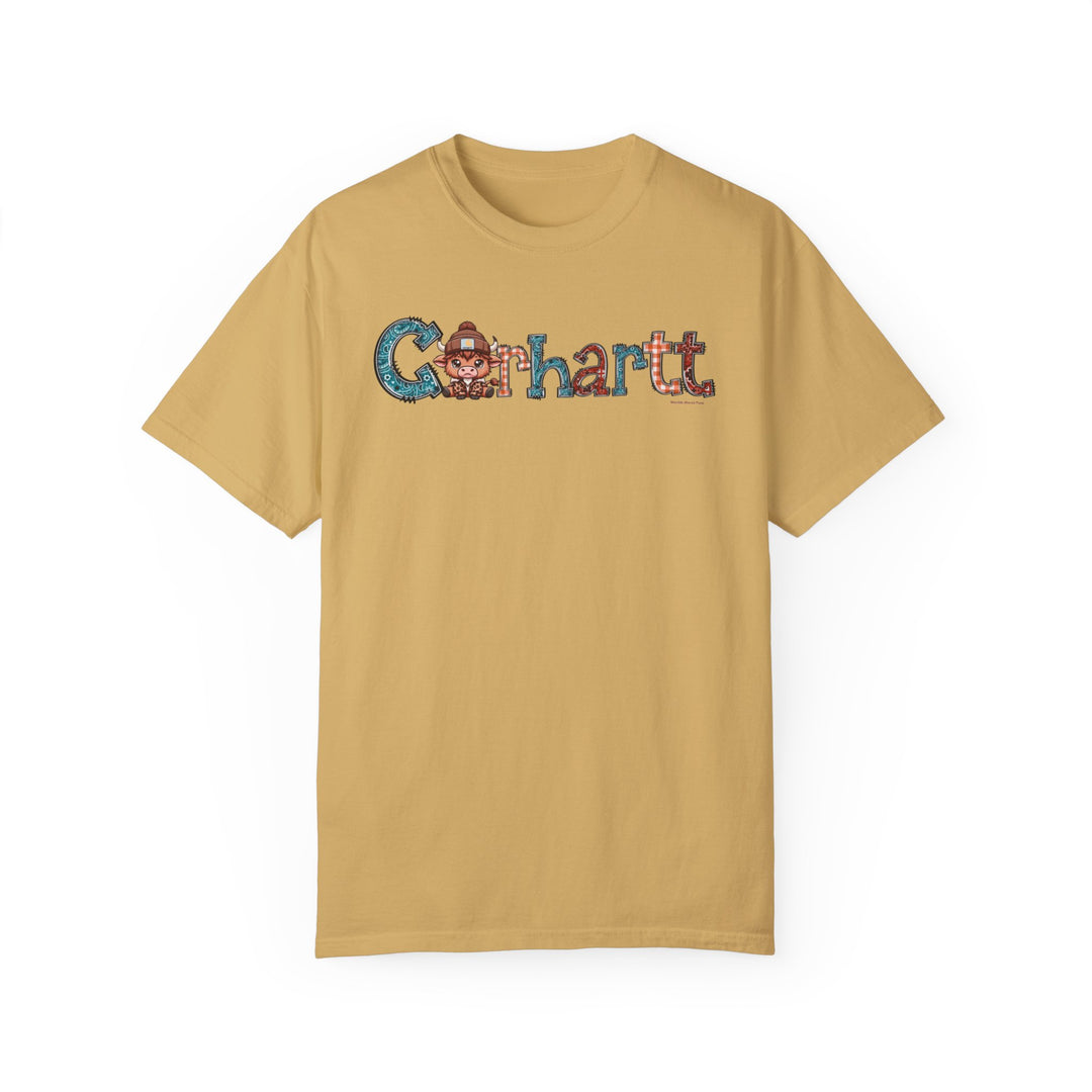 A tan Cowhartt Tee, 100% ring-spun cotton, garment-dyed for coziness. Relaxed fit, double-needle stitching for durability, no side-seams for shape retention. Medium weight, ideal for daily wear.