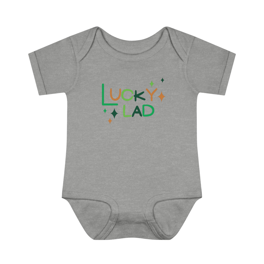 A Lucky Lad Onesie, ideal for infants, features soft ring-spun cotton, lap shoulders, and a one-piece design. Unisex fit, light fabric, tear-away label. From Worlds Worst Tees.
