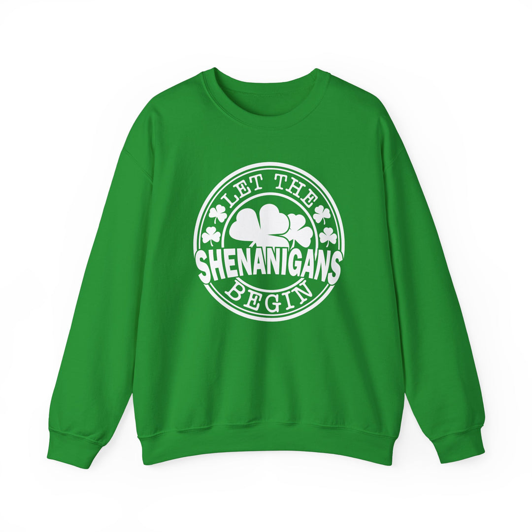 Green 'Let the Shenanigans Begin Day' crewneck sweatshirt featuring a white circle with a shamrock, offering a cozy, unisex fit with ribbed collar.